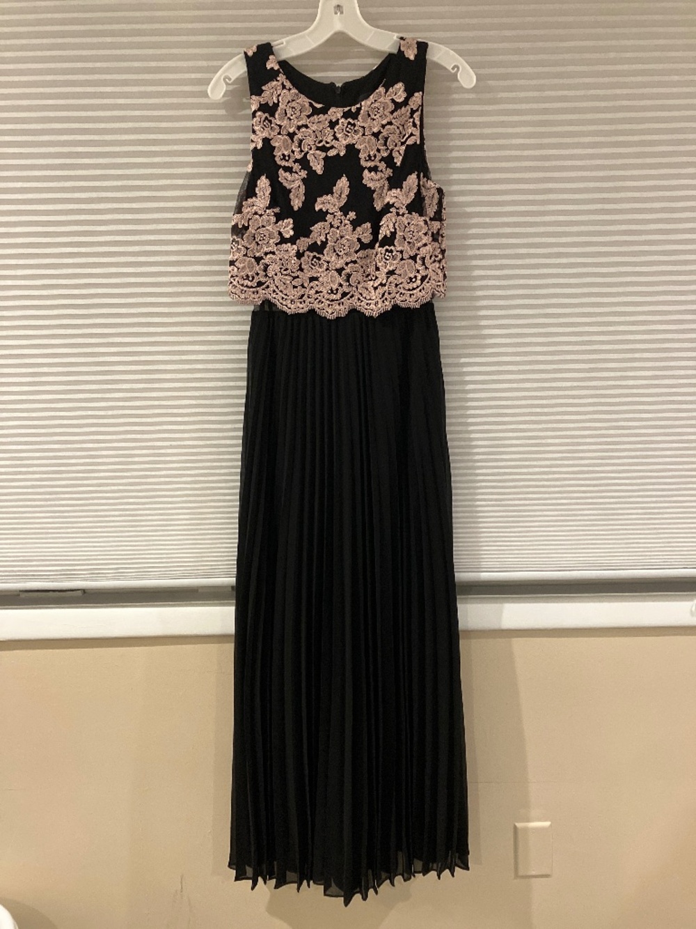 Elegant Black Gown with intricate pink detailing wedding guest